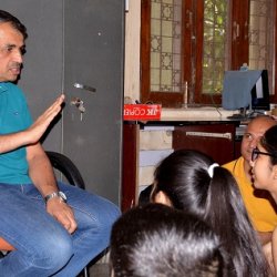 Prof. Shashidhara responding to children during their meeting